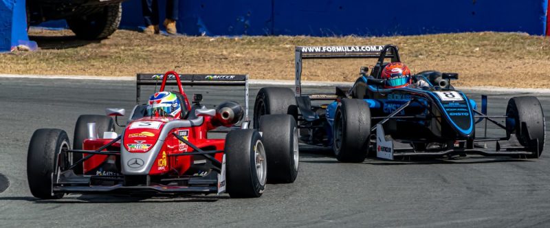 Car 3 leads car 8 out of turn 2 at Queensland Raceway in a formula 3 race
